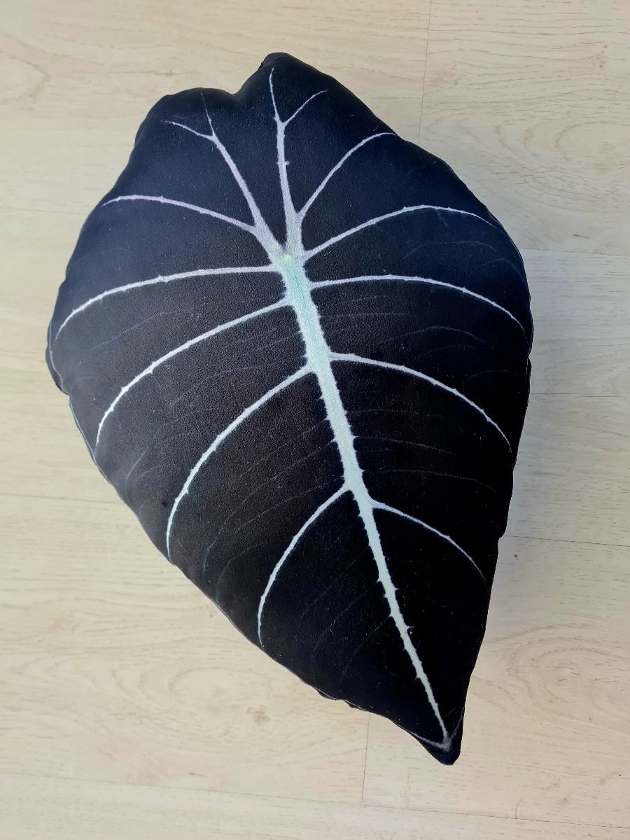 Handmade black leaf throw pillow